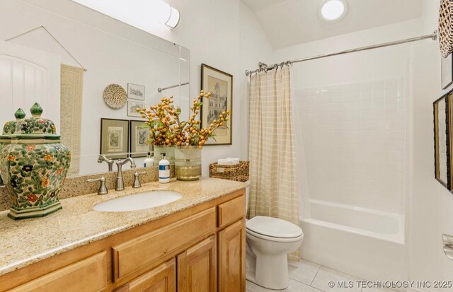 461 Cross Timbers Blvd, Sapulpa, OK 74066 - bathroom featuring vanity, shower / bath combination with curtain, tile patterned floors, toilet, and vaulted ceiling