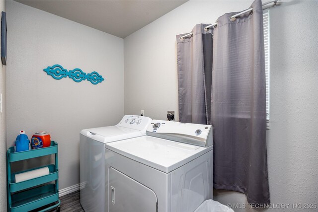 647 Sawmill Rd, Durant, OK 74701 - laundry room with washer and clothes dryer and laundry area