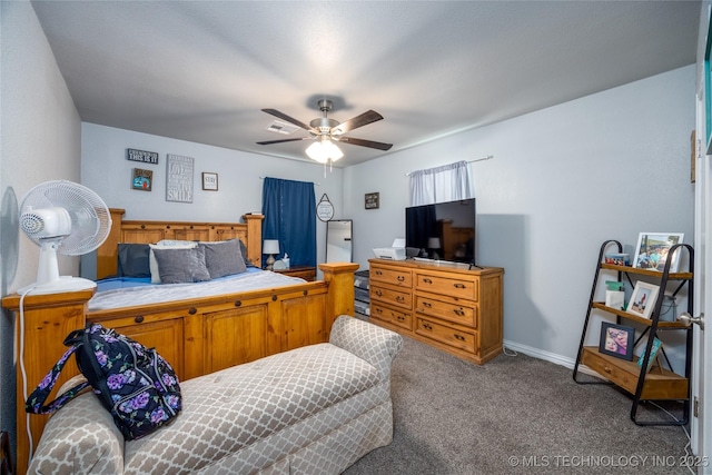 647 Sawmill Rd, Durant, OK 74701 - bedroom featuring a ceiling fan, baseboards, and carpet