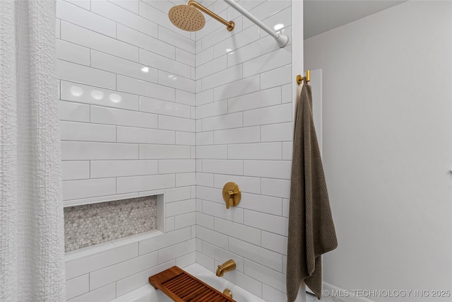 bathroom with shower / tub combo with curtain