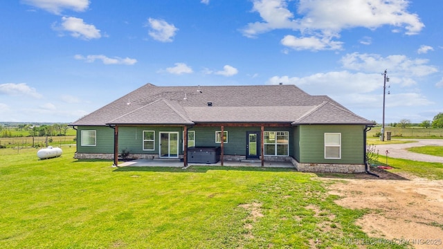 9153 S 4270th Rd, Chelsea, OK 74016 - back of house with a patio area, a yard, a hot tub, and roof with shingles