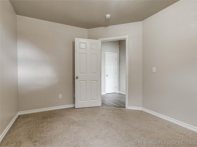 12520 S Birch Ave, Jenks, OK 74037 - carpeted spare room featuring baseboards and a smoke detector