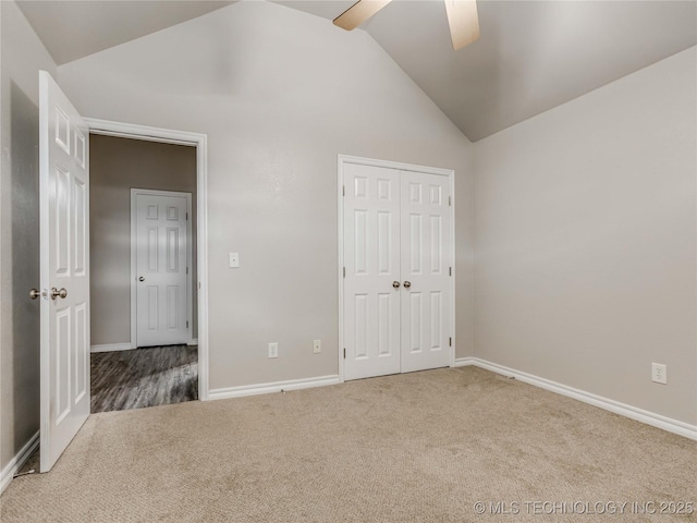 12520 S Birch Ave, Jenks, OK 74037 - unfurnished bedroom with carpet, vaulted ceiling, a closet, and ceiling fan