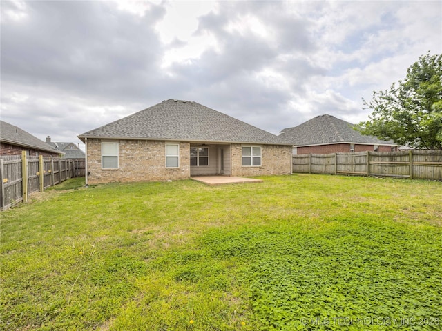 12520 S Birch Ave, Jenks, OK 74037 - back of house with a fenced backyard, a patio area, brick siding, and roof with shingles