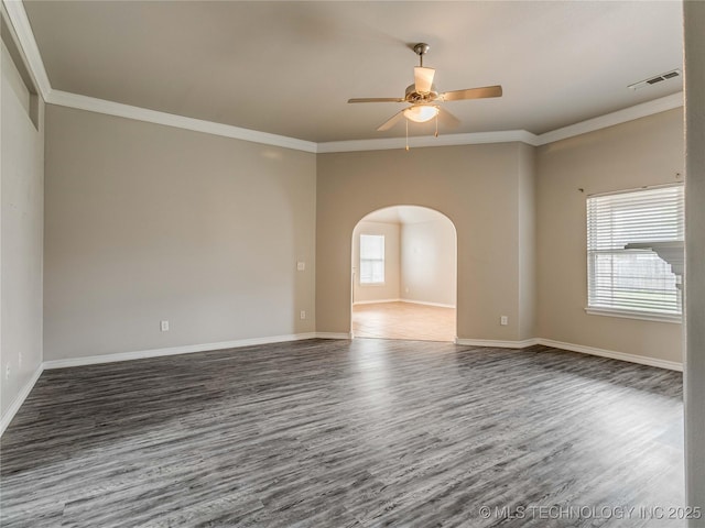 12520 S Birch Ave, Jenks, OK 74037 - spare room with arched walkways, wood finished floors, ceiling fan, and ornamental molding