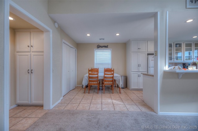 3249 S 138th E Ave, Tulsa, OK 74134 - dining space with recessed lighting, baseboards, light carpet, and light tile patterned floors