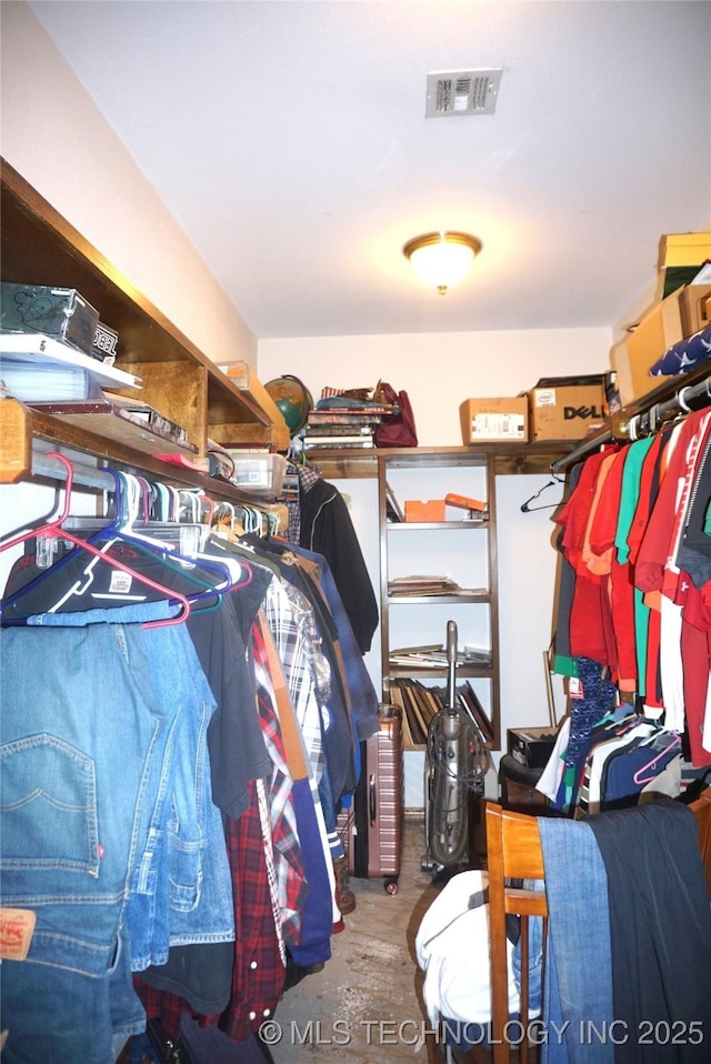 walk in closet with visible vents