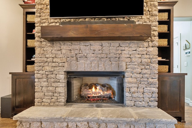 18510 E 46th Pl S, Tulsa, OK 74134 - detailed view of a fireplace, wood finished floors, and built in features