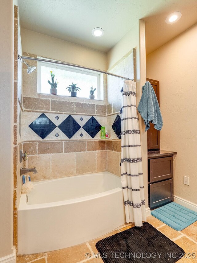 21125 State Highway 99 S, Stonewall, OK 74871 - bathroom featuring shower / bath combo with shower curtain