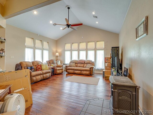 21125 State Highway 99 S, Stonewall, OK 74871 - living area featuring high vaulted ceiling, ceiling fan, a wealth of natural light, and visible vents