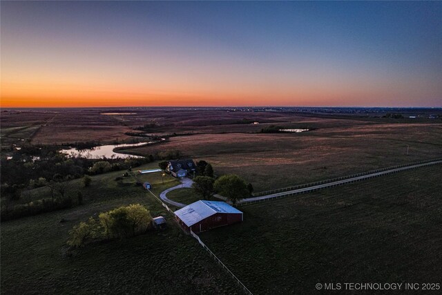 2445 E 156th St N, Skiatook, OK 74070 - aerial view at dusk with a rural view