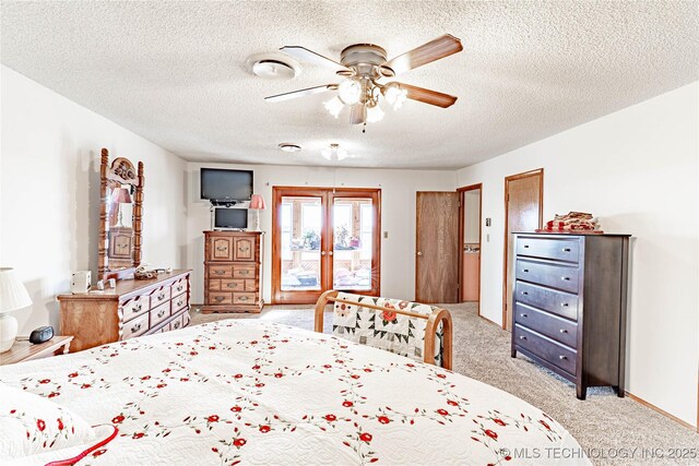 2445 E 156th St N, Skiatook, OK 74070 - bedroom with light carpet, access to outside, a textured ceiling, and ceiling fan