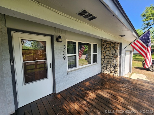 359 S California, Atoka, OK 74525 - wooden deck featuring visible vents