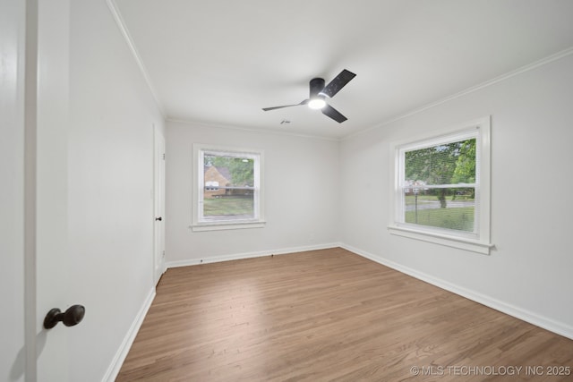 1136 S Evanston Ave, Tulsa, OK 74104 - spare room with ornamental molding, light wood-type flooring, baseboards, and ceiling fan