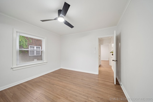 1136 S Evanston Ave, Tulsa, OK 74104 - empty room with ornamental molding, light wood-style floors, a ceiling fan, baseboards, and attic access