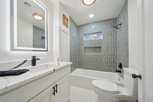 1136 S Evanston Ave, Tulsa, OK 74104 - full bath featuring toilet, vanity, bathing tub / shower combination, and recessed lighting