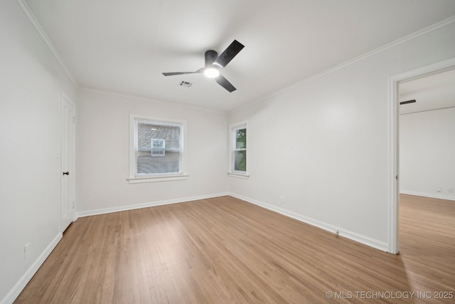 1136 S Evanston Ave, Tulsa, OK 74104 - unfurnished room featuring light wood-style flooring, a ceiling fan, crown molding, and baseboards