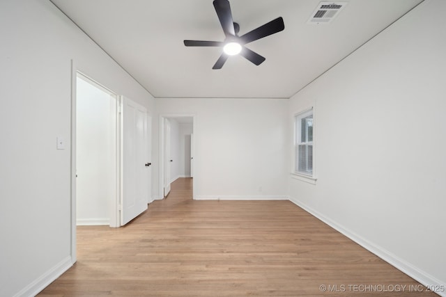 1136 S Evanston Ave, Tulsa, OK 74104 - empty room featuring a ceiling fan, light wood finished floors, and baseboards