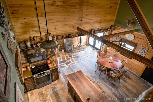 interior space with wooden walls and wood-type flooring