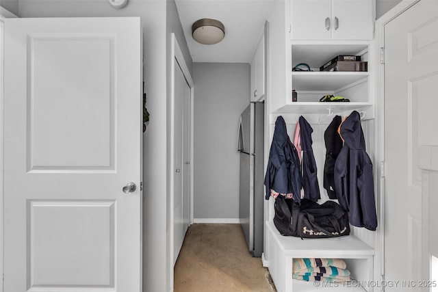 3334 S Wheeling Ave, Tulsa, OK 74105 - mudroom with baseboards and concrete floors