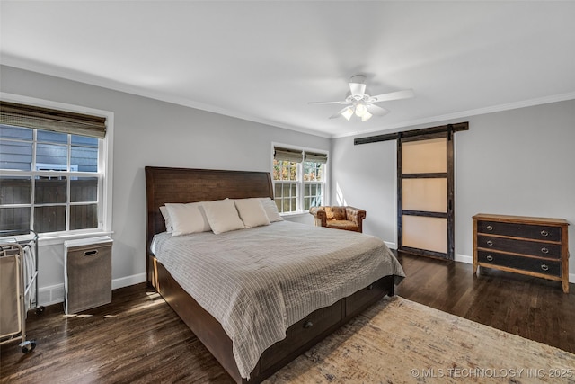 3334 S Wheeling Ave, Tulsa, OK 74105 - bedroom with baseboards, a barn door, wood finished floors, and ornamental molding