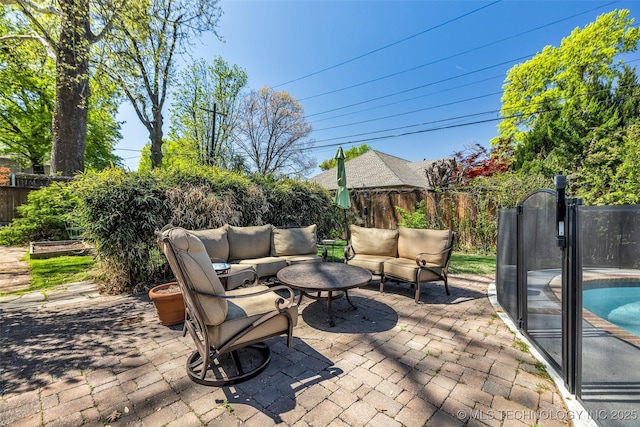 3334 S Wheeling Ave, Tulsa, OK 74105 - view of patio featuring a fenced in pool, an outdoor hangout area, and a fenced backyard