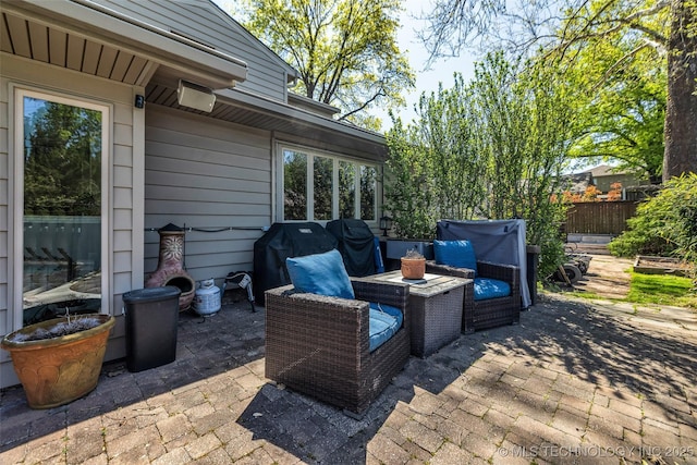3334 S Wheeling Ave, Tulsa, OK 74105 - view of patio featuring a grill and fence