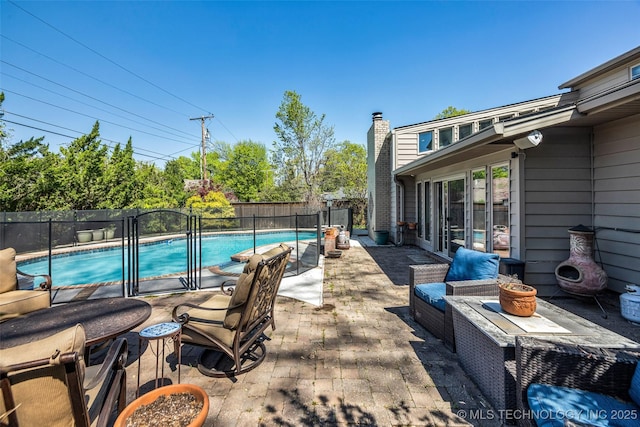 3334 S Wheeling Ave, Tulsa, OK 74105 - view of pool with a patio, outdoor lounge area, a fenced in pool, and a fenced backyard