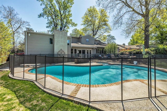 3334 S Wheeling Ave, Tulsa, OK 74105 - view of swimming pool with a fenced in pool and fence