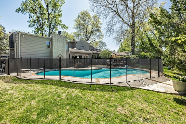 3334 S Wheeling Ave, Tulsa, OK 74105 - view of swimming pool with a lawn, fence, and a fenced in pool
