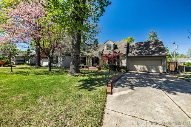 3334 S Wheeling Ave, Tulsa, OK 74105 - view of front facade with a front yard, driveway, an attached garage, and roof with shingles