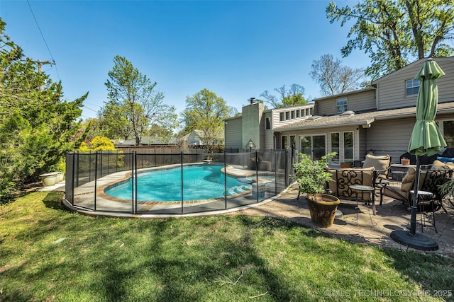 3334 S Wheeling Ave, Tulsa, OK 74105 - view of pool with fence, a yard, a patio area, and a pool with connected hot tub