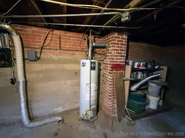 utility room featuring gas water heater