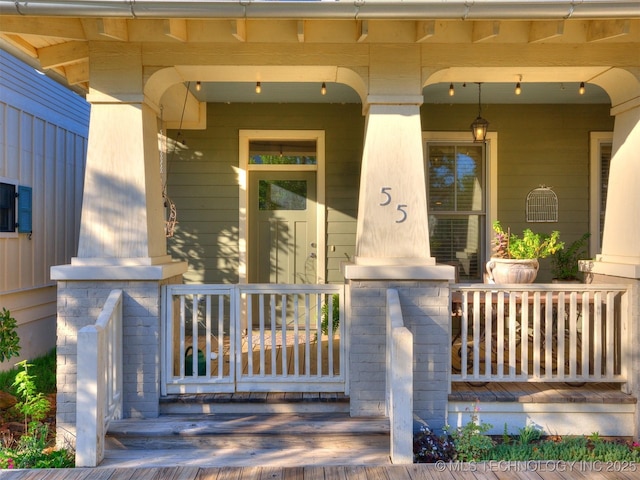 55 Boardwalk, Carlton Landing, OK 74432 - property entrance featuring covered porch