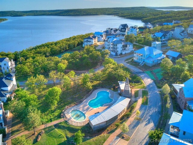 55 Boardwalk, Carlton Landing, OK 74432 - aerial view of residential area with a nearby body of water and a pool area