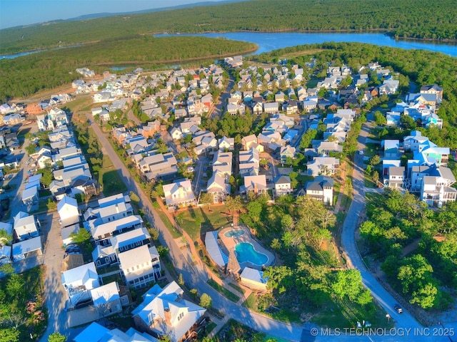 55 Boardwalk, Carlton Landing, OK 74432 - aerial perspective of suburban area with a forest and a nearby body of water