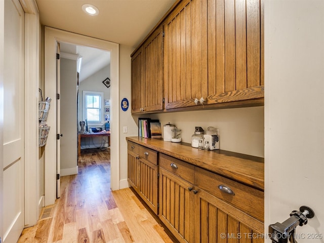 55 Boardwalk, Carlton Landing, OK 74432 - hall with light wood-type flooring, a desk, recessed lighting, and baseboards