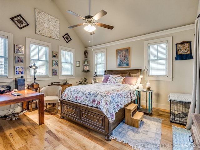 55 Boardwalk, Carlton Landing, OK 74432 - bedroom with light wood-style floors, multiple windows, baseboards, high vaulted ceiling, and a ceiling fan