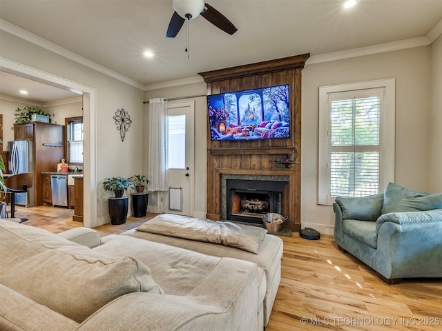55 Boardwalk, Carlton Landing, OK 74432 - living area with a ceiling fan, plenty of natural light, a high end fireplace, recessed lighting, and light wood-type flooring