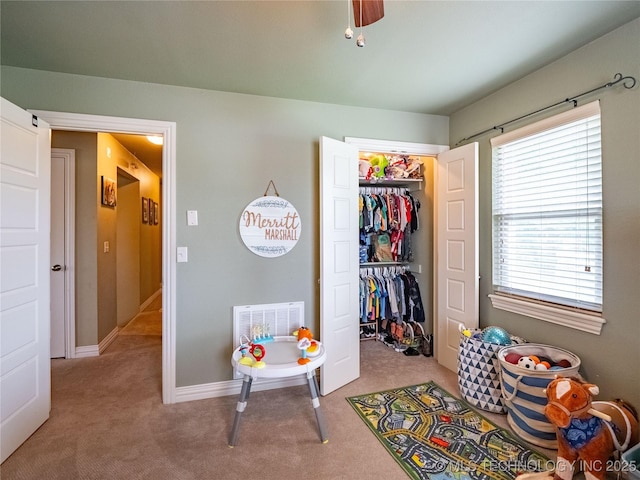 509 Dove Dr, Mcalester, OK 74501 - playroom featuring baseboards, carpet, and a ceiling fan