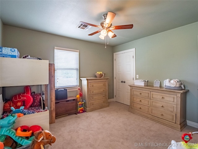 509 Dove Dr, Mcalester, OK 74501 - bedroom with ceiling fan, light colored carpet, baseboards, and visible vents