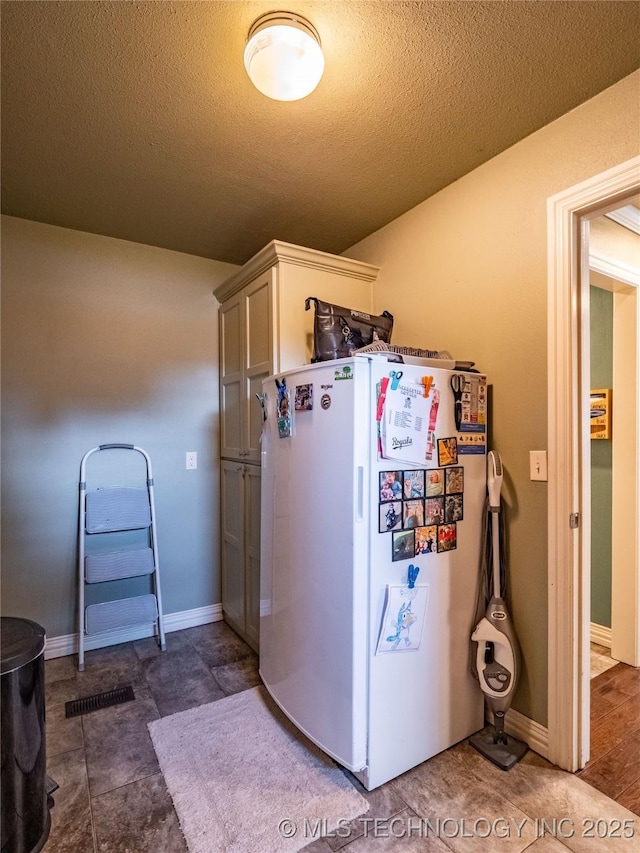 509 Dove Dr, Mcalester, OK 74501 - washroom featuring a textured ceiling