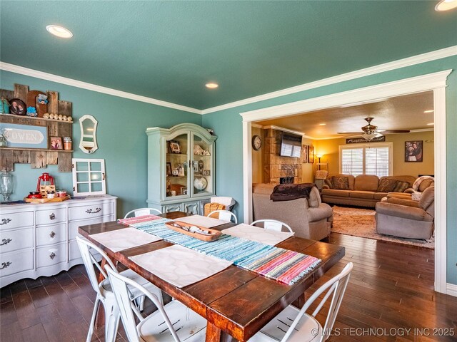 509 Dove Dr, Mcalester, OK 74501 - dining space with crown molding, recessed lighting, and dark wood-style flooring