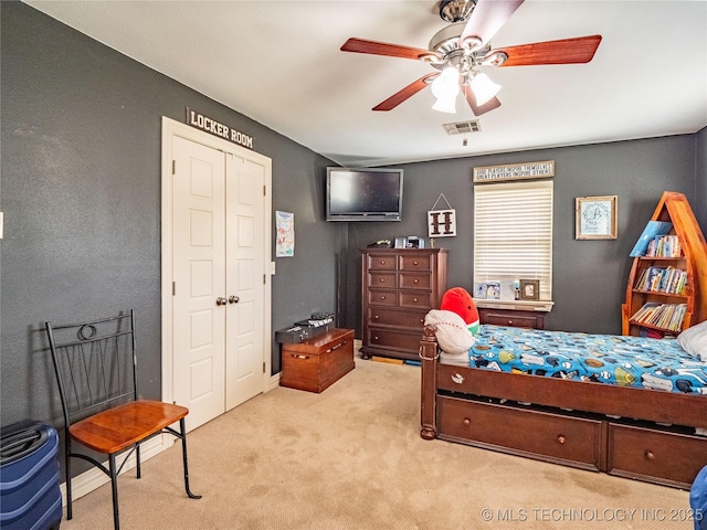 509 Dove Dr, Mcalester, OK 74501 - bedroom featuring light colored carpet, a ceiling fan, and visible vents