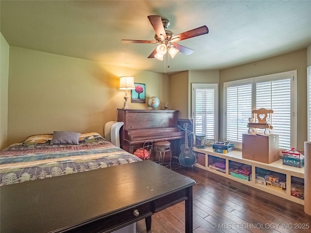509 Dove Dr, Mcalester, OK 74501 - bedroom with a ceiling fan and hardwood / wood-style floors