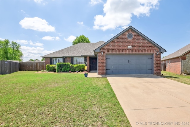 view of front of property with driveway, brick siding, fence, a front lawn, and an attached garage