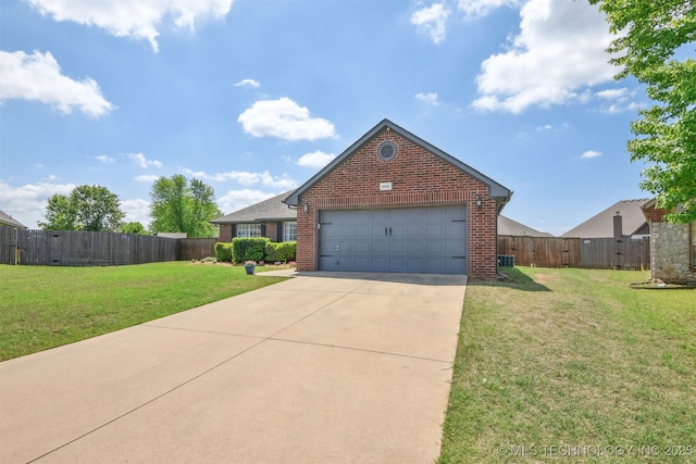 view of front of home with concrete driveway, brick siding, and a front lawn