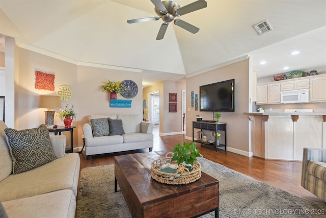 living room featuring dark wood-style flooring, ceiling fan, recessed lighting, baseboards, and visible vents