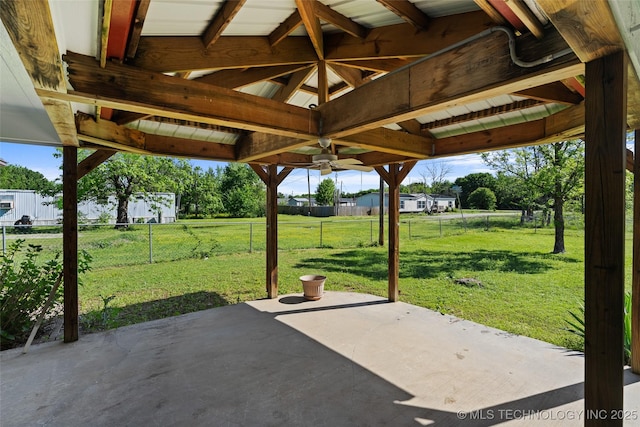 view of patio featuring fence, a ceiling fan, and a gazebo