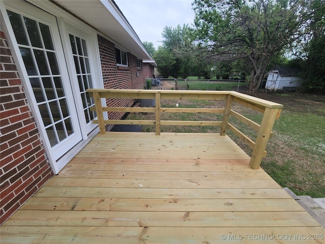 wooden deck featuring french doors